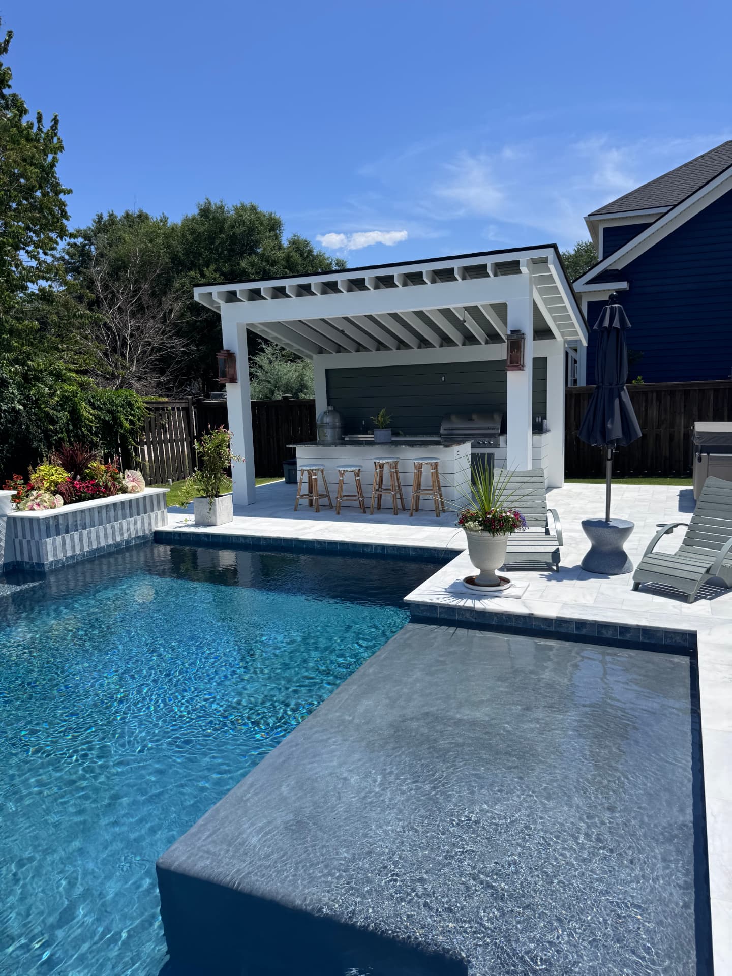 Poolside cabana with outdoor bar by Holy City Pergolas